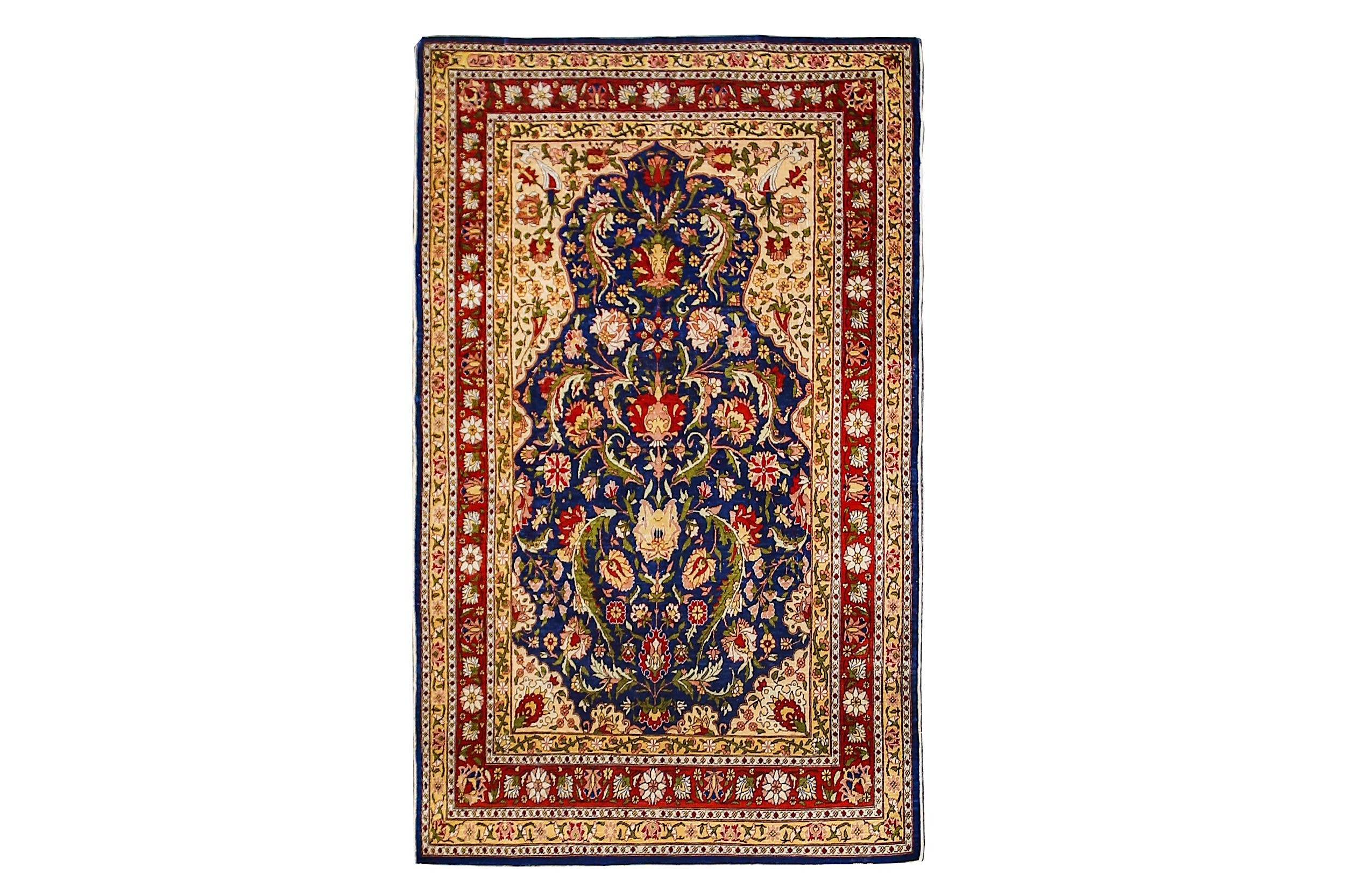 AN EXTREMELY FINE SILK HEREKE RUG, TURKEY approx: 4ft.7in. x 2ft.9in.(140cm. x 84cm.) The field with