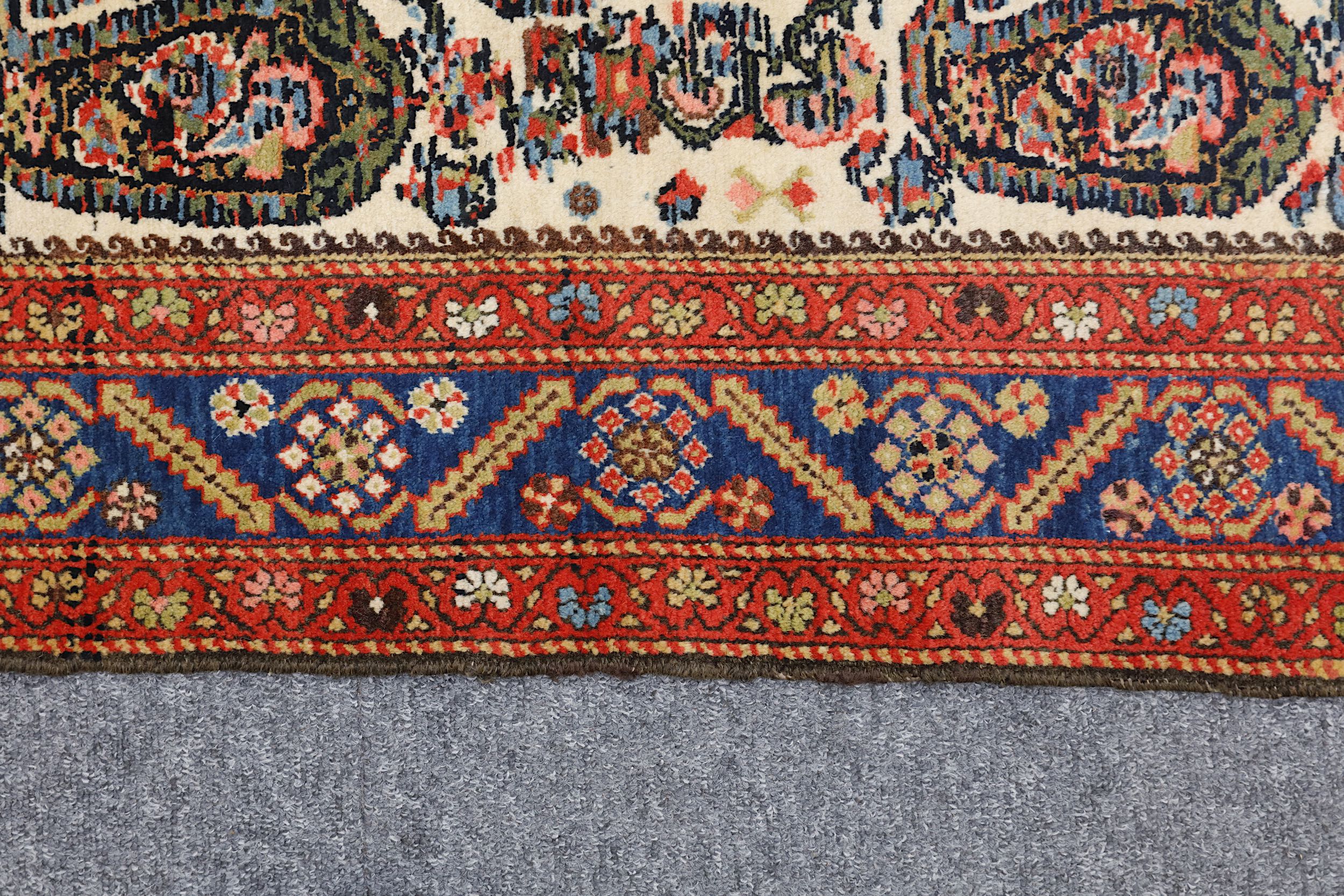 A FINE MALAYIR RUG, WEST PERSIA approx: 6ft.1in. x 4ft.4in.(185cm. x 132cm.) the ivory field with - Image 3 of 5