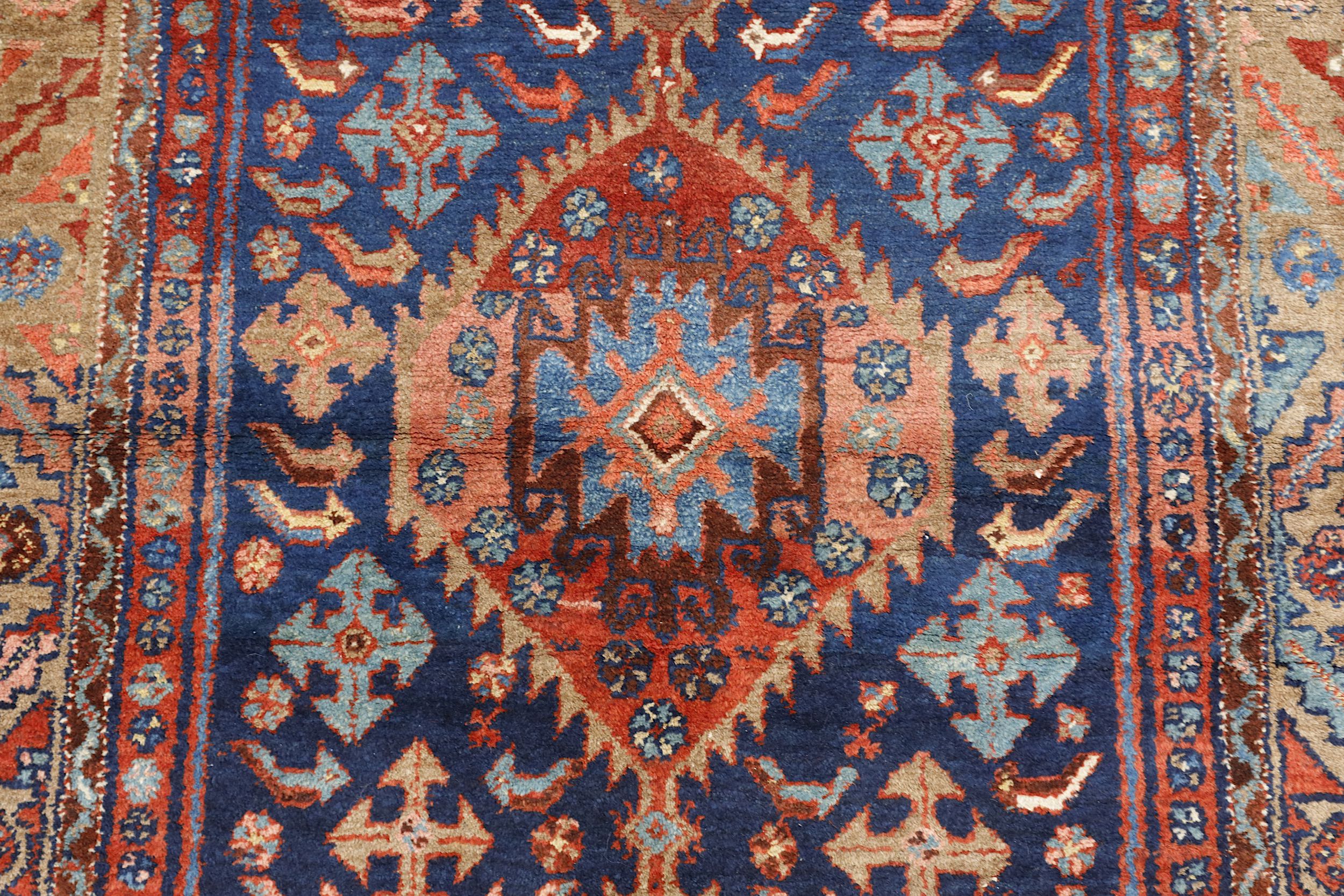 A FINE HAMADAN RUG, WEST PERSIA approx: 6ft.9in. x 4ft.3in.(206cm. x 130cm.) The field with three