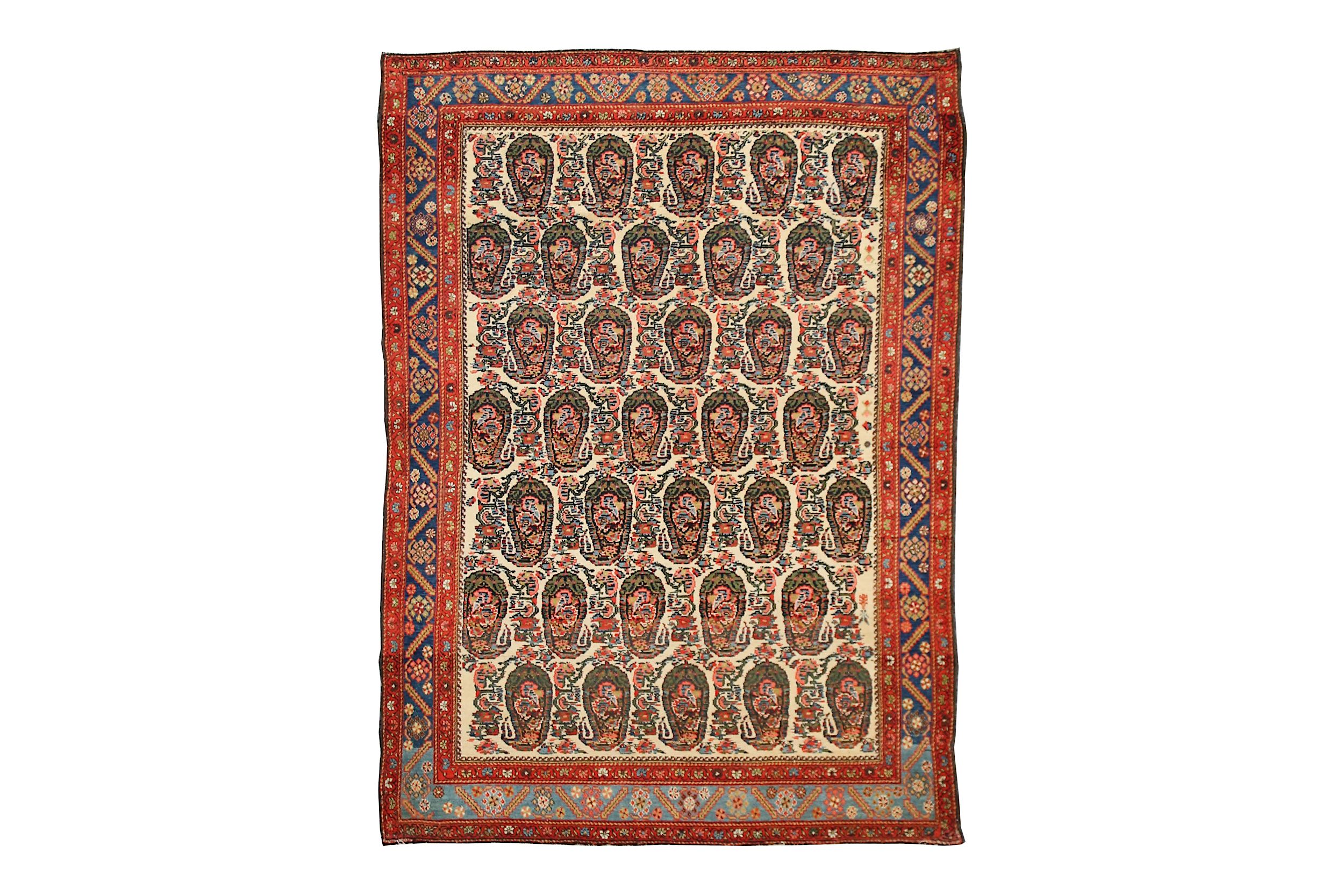 A FINE MALAYIR RUG, WEST PERSIA approx: 6ft.1in. x 4ft.4in.(185cm. x 132cm.) the ivory field with