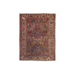 A BAKHTIARI CARPET, WEST PERSIA approx: 13ft. x 9ft.10in.(395cm. x 299cm.) the field with stylised