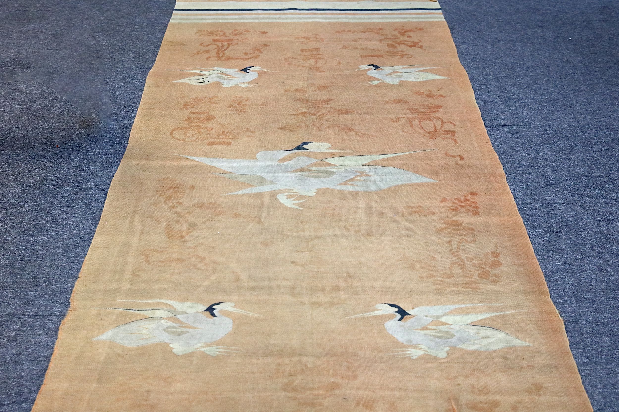 AN UNUSUAL ANTIQUE MONGOLIAN KILIM approx: 11ft.2in. x 4ft.(339cm. x 122cm.) The field depicting - Image 2 of 5