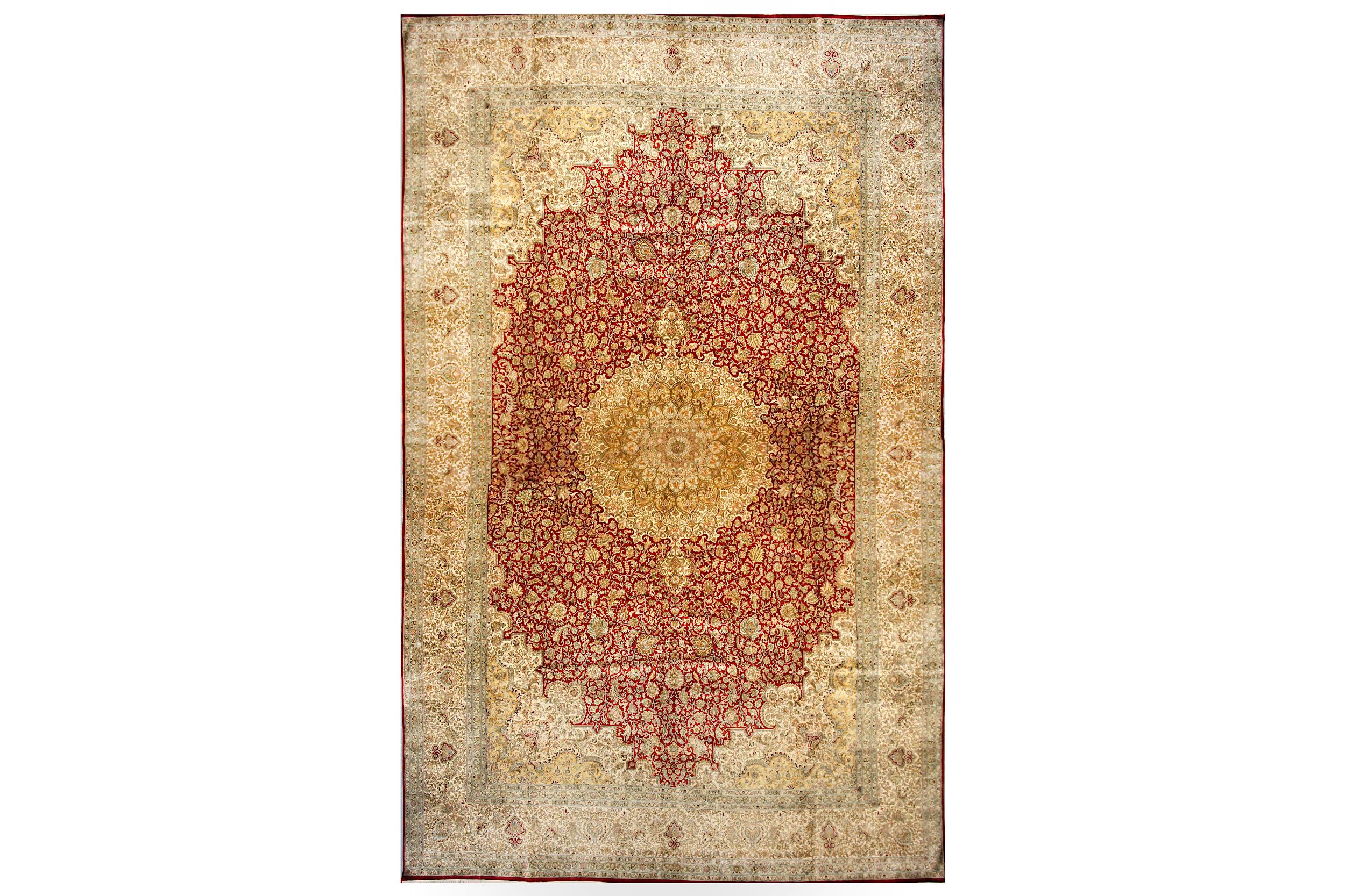 AN EXTREMELY FINE SILK INDIAN CARPET approx: 19ft.3in. x 11ft.8in.(585cm.x 354cm.) Superb quality
