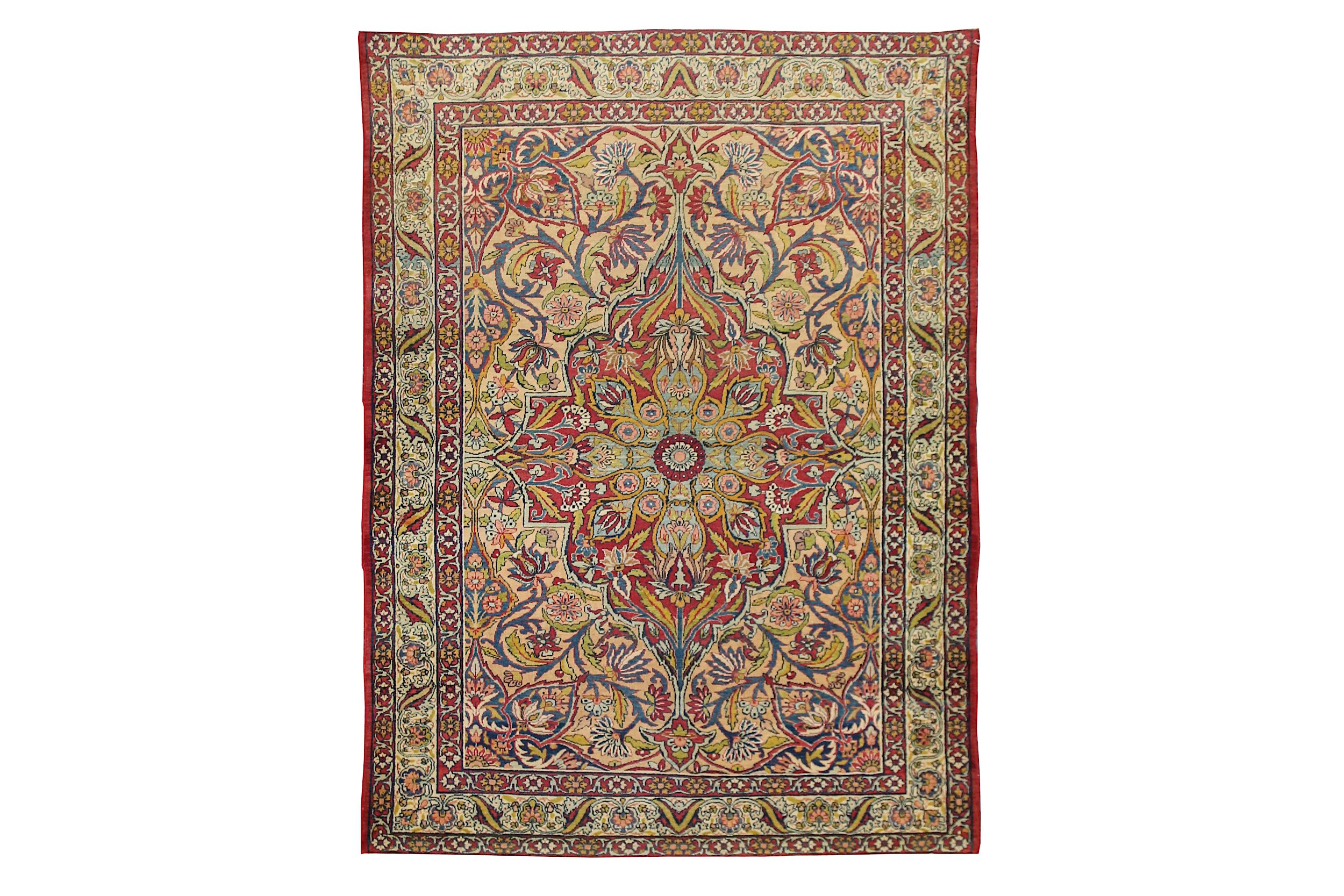 AN ANTIQUE KIRMAN LAVER RUG, SOUTH PERSIA approx: 6ft.8in. x 4ft.9in.(204cm. x 145cm.)  Beautiful