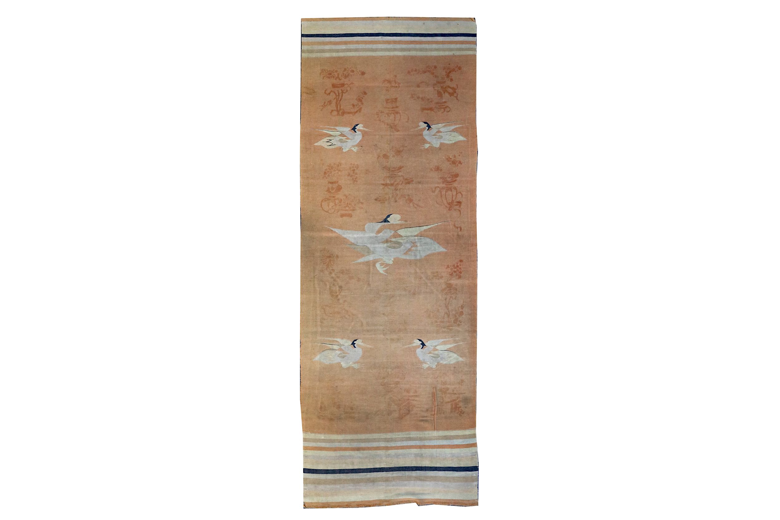 AN UNUSUAL ANTIQUE MONGOLIAN KILIM approx: 11ft.2in. x 4ft.(339cm. x 122cm.) The field depicting