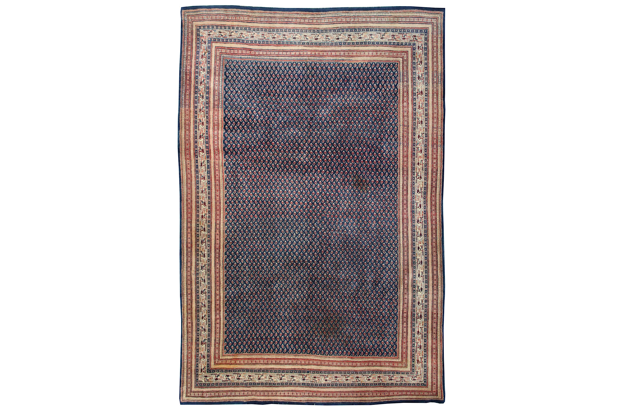 A FINE SERABAND CARPET, WEST PERSIA approx: 11ft.6in. x 8ft.2in.(350cm. x 248cm.) The field with