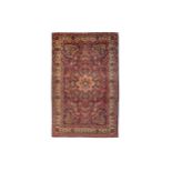 AN ANTIQUE KIRMAN LAVER RUG, SOUTH PERSIA approx: 7ft.3in. x 4ft.7in.(221cm. x 140cm.) Classic