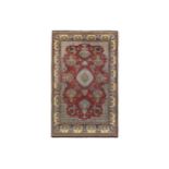 A FINE QUM RUG, CENTRAL PERSIA approx: 7ft.5in. x 4ft.8in.(226cm. x 142cm.) The field with