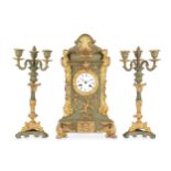 A LATE 19TH CENTURY PAINTED AND GILT METAL CLOCK GARNITURE