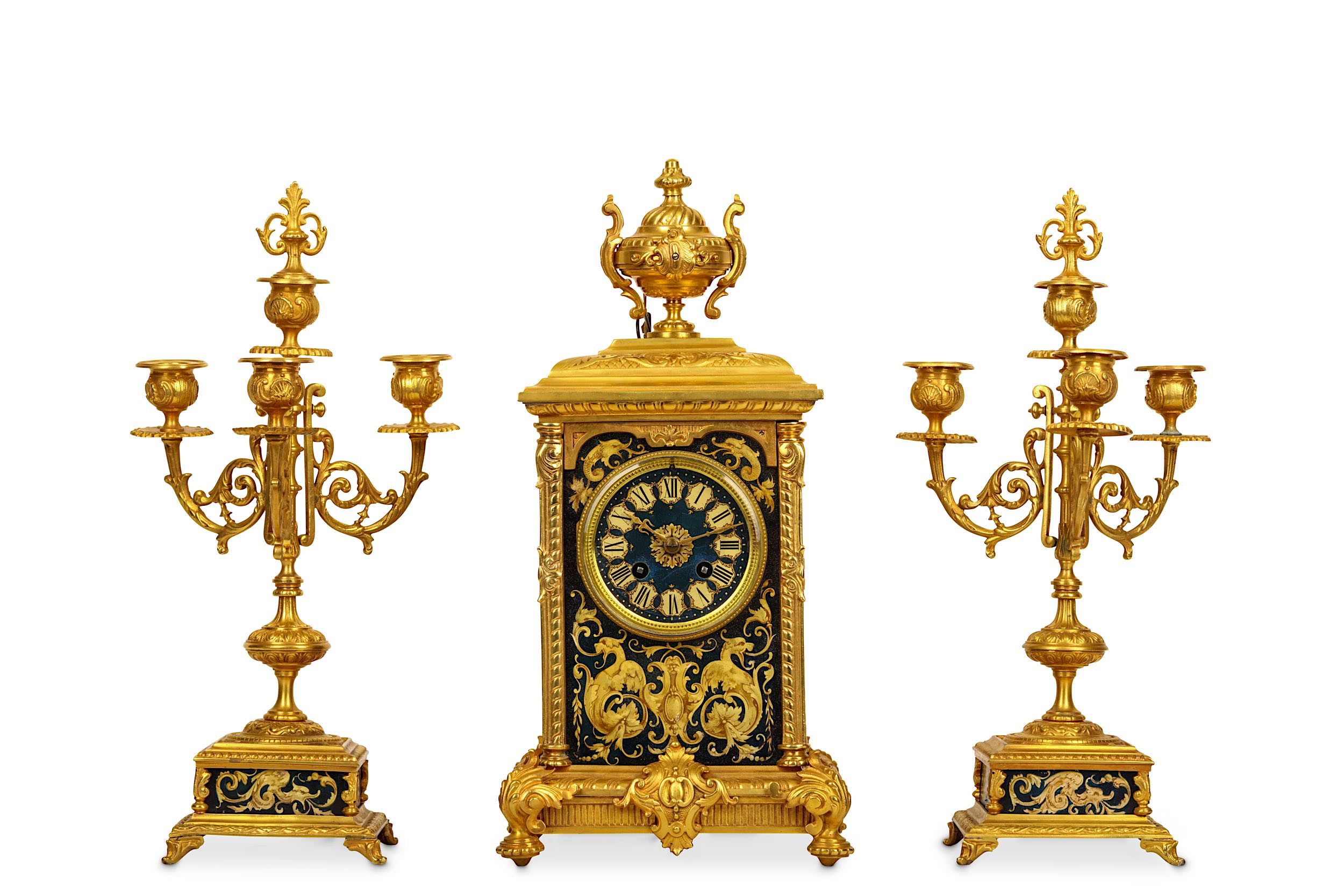 A LATE 19TH CENTURY FRENCH GILT BRONZE AND TOLE PEINTRE CLOCK GARNITURE IN THE RENAISSANCE REVIVAL S