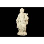 A 17TH CENTURY ITALIAN CARRARA MARBLE FIGURE OF ST BARBARA WITH HER TOWER