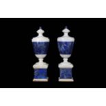 A PAIR OF NEO-CLASSICAL STYLE WHITE MARBLE AND LAPIS LAZULI URNS