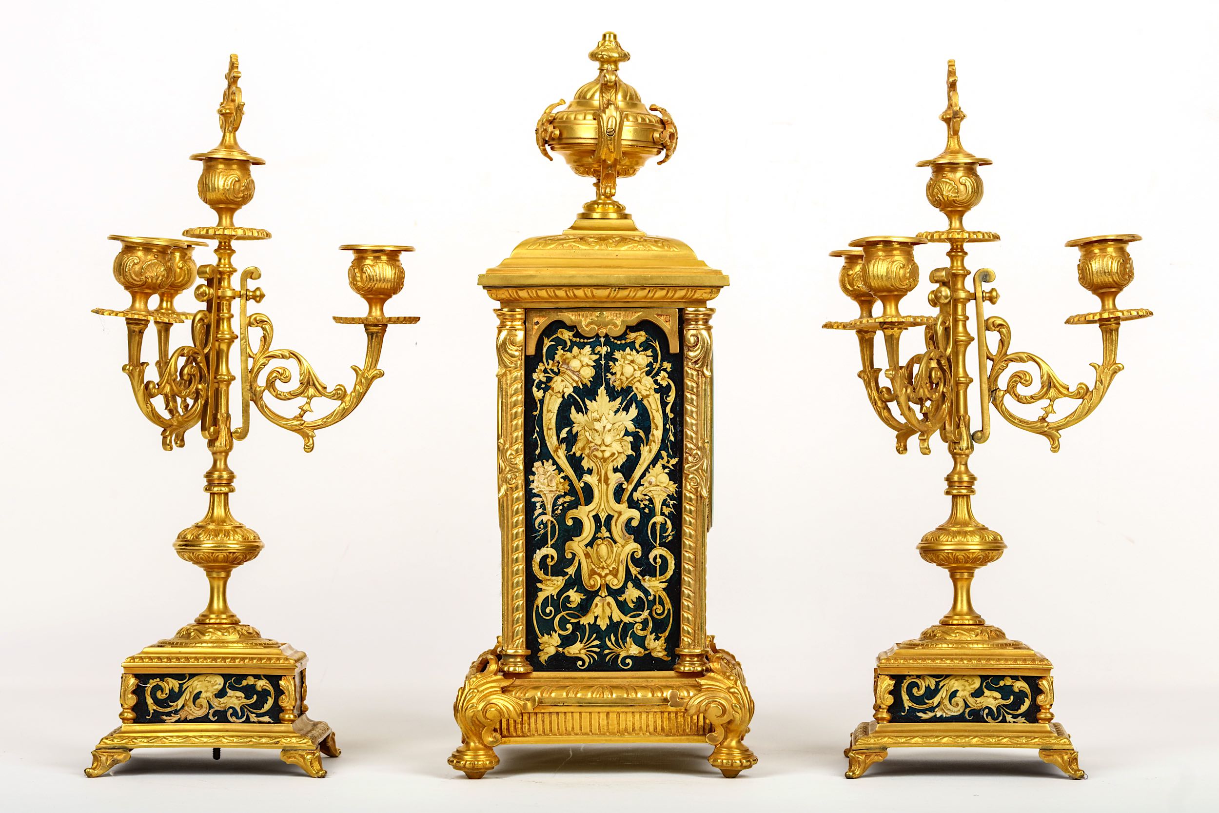 A LATE 19TH CENTURY FRENCH GILT BRONZE AND TOLE PEINTRE CLOCK GARNITURE IN THE RENAISSANCE REVIVAL S - Image 2 of 4