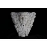 A 19TH CENTURY FRENCH OR ITALIAN WHITE MARBLE CORBEL MODELLED AS A MALE MASK