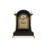 A LATE 19TH CENTURY EBONISED AND GILT BRASS MOUNTED QUARTER STRIKING FUSEE TABLE / MANTEL CLOCK