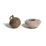 TWO EARTHENWARE VESSELS Circa 1st Millennium B.C. Including a squat vessel with incised decoration