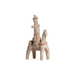 A CLAY HORSE AND RIDER Circa 1st Millennium B.C. Both the horse and rider are depicted in a highly