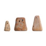 THREE LARGE ROMANO-EGYPTIAN TERRACOTTA WEIGHTS Circa 1st Century B.C. - 1st Century A.D. Each weight