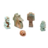 A GROUP OF EGYPTIAN GLAZED COMPOSITION AMULETS Including a blue udjat eye, surmounted by a