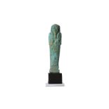 AN EGYPTIAN GLAZED COMPOSITION SHABTI 26th Dynasty, Circa 663 - 332 B.C. A bright blue glazed