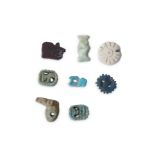 A GROUP OF EGYPTIAN AMULETS Circa 1st Millennium B.C. Including two glazed composition Bes