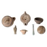 A GROUP OF ANCIENT PIECES Circa 1st Millennium B.C. - 4th Century A.D. Including a fragmentary