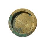 A COPPER AND SILVER-INLAID BRASS DISH Iran, 12th -