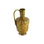 A KHORASSANI COPPER-INLAID BRASS EWER Iran, 11th -