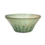 A MOULD-BLOWN GREEN GLASS BOWL Possibly Iran, 10th