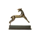 A SILVER AND COPPER-INLAID BRASS GAZELLE Iran, 11t