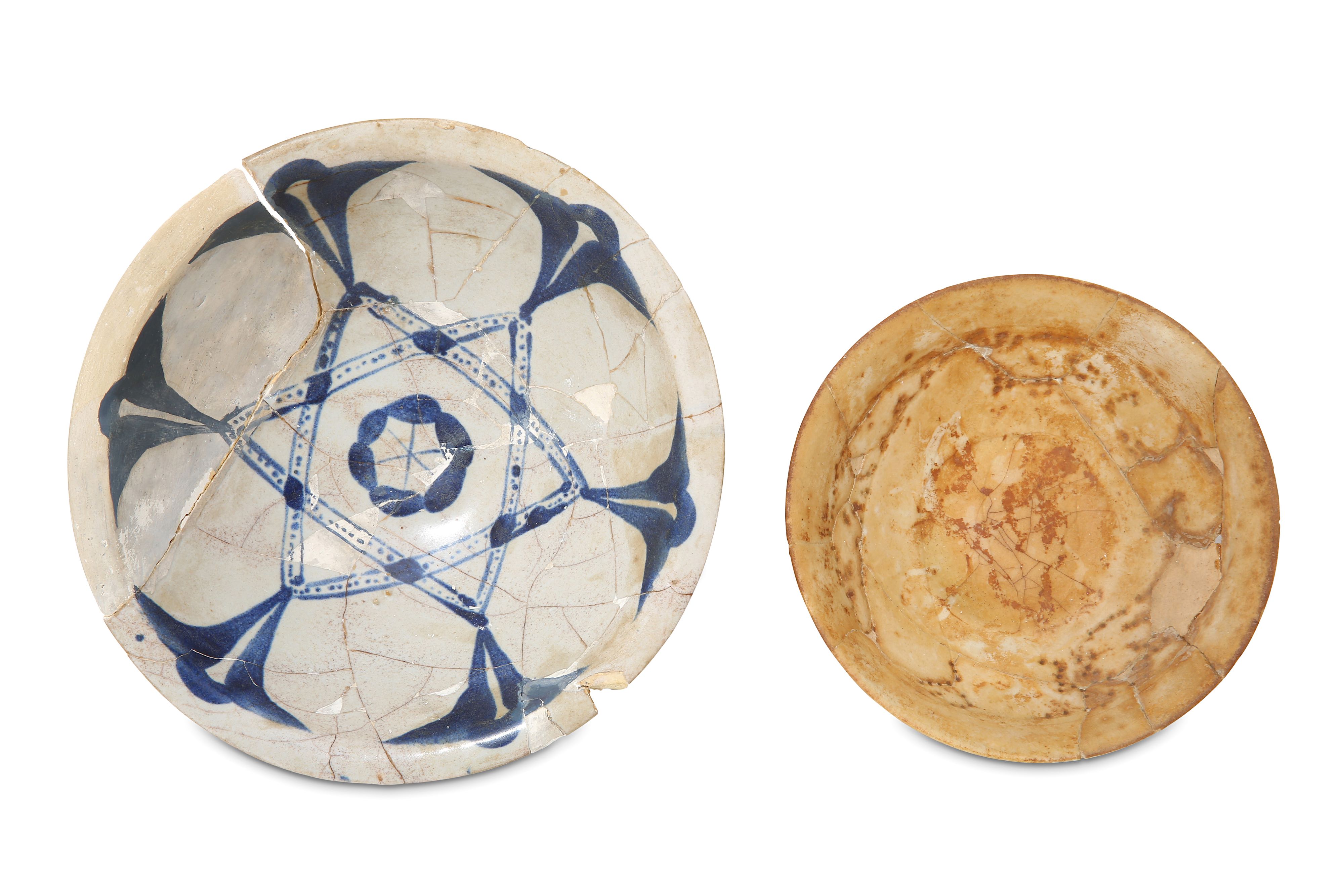 AN ABBASID BLUE AND WHITE POTTERY DISH AND AN IRAN
