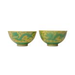 A PAIR OF CHINESE YELLOW-GROUND 'DRAGON' BOWLS.
