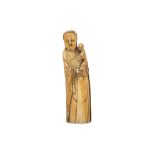 A CHINESE MARINE IVORY FIGURE OF GUANYIN AND CHILD.