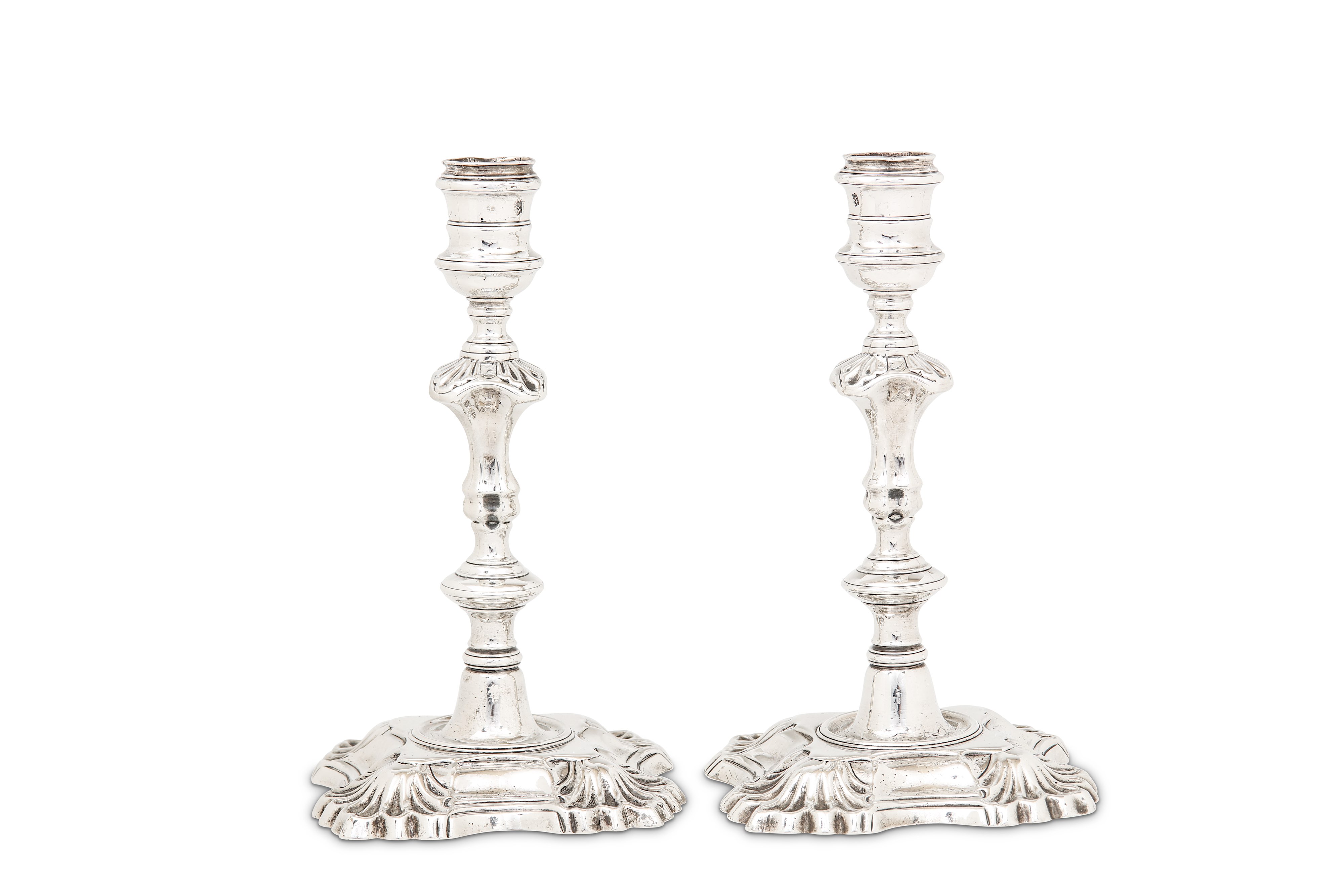 A pair of George II sterling silver candlesticks, London 1747 by James Gould