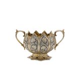 A late 19th century Anglo – Indian Raj unmarked parcel-gilt silver twin handled sugar bowl, Kashmir,