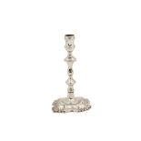 A George II sterling silver candlestick, London 1753 by John Cafe