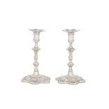 A pair of George II sterling silver candlesticks, London 1752 by John Cafe