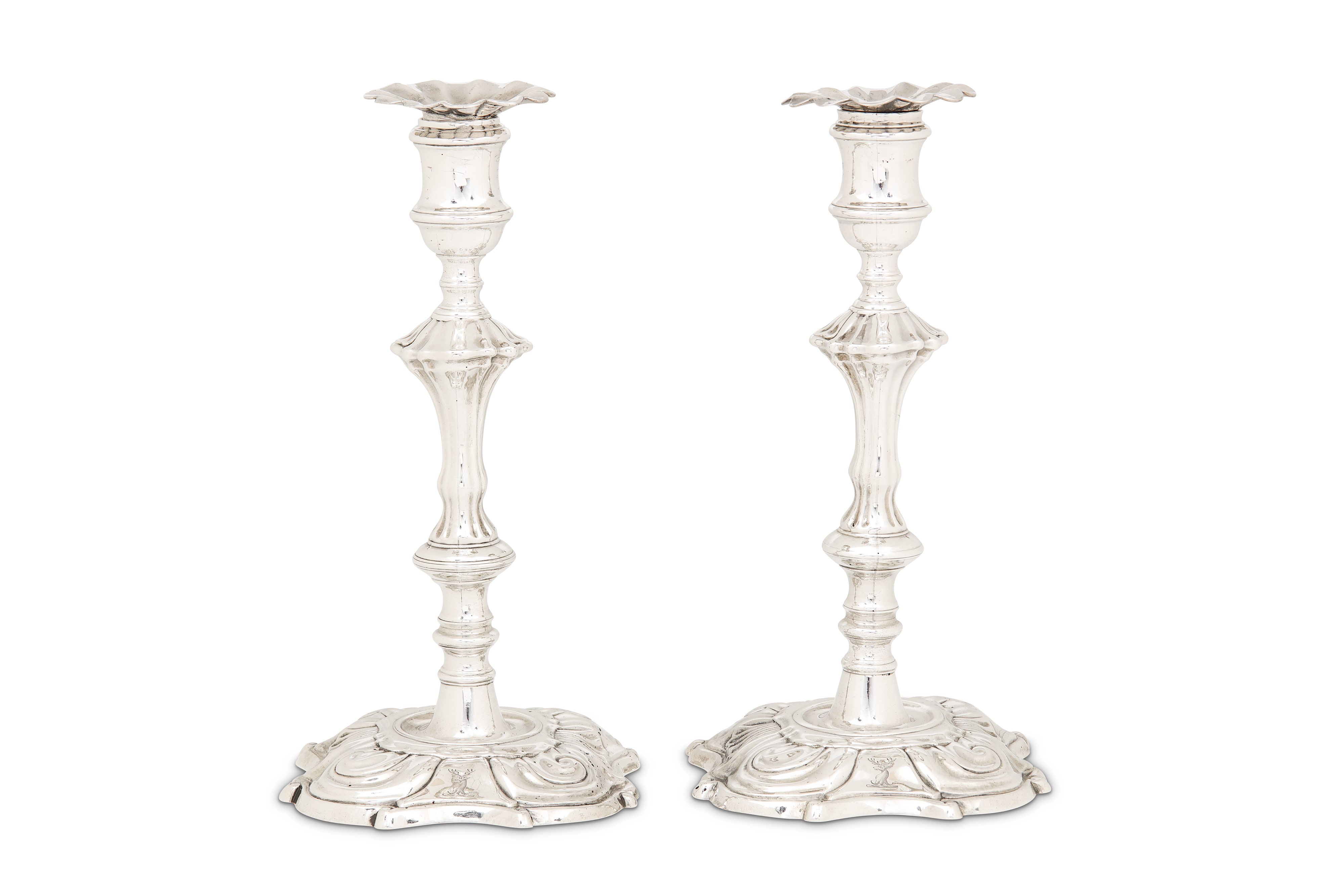 A pair of George II sterling silver candlesticks, London 1744 by James Gould