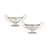A pair of George III sterling silver twin handled sauce tureen bases, London 1794 by John Scofield (