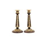 A pair of Victorian silver-gilt mounted tortoiseshell candlesticks, London 1877 by Walter Thornhill