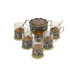 A mid to late 20th century Iranian unmarked gilt white metal and cloisonne enamel tea glass set, pro