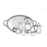 An Edwardian sterling silver five-piece tea and coffee service on a twin handled tray, London 1909 b