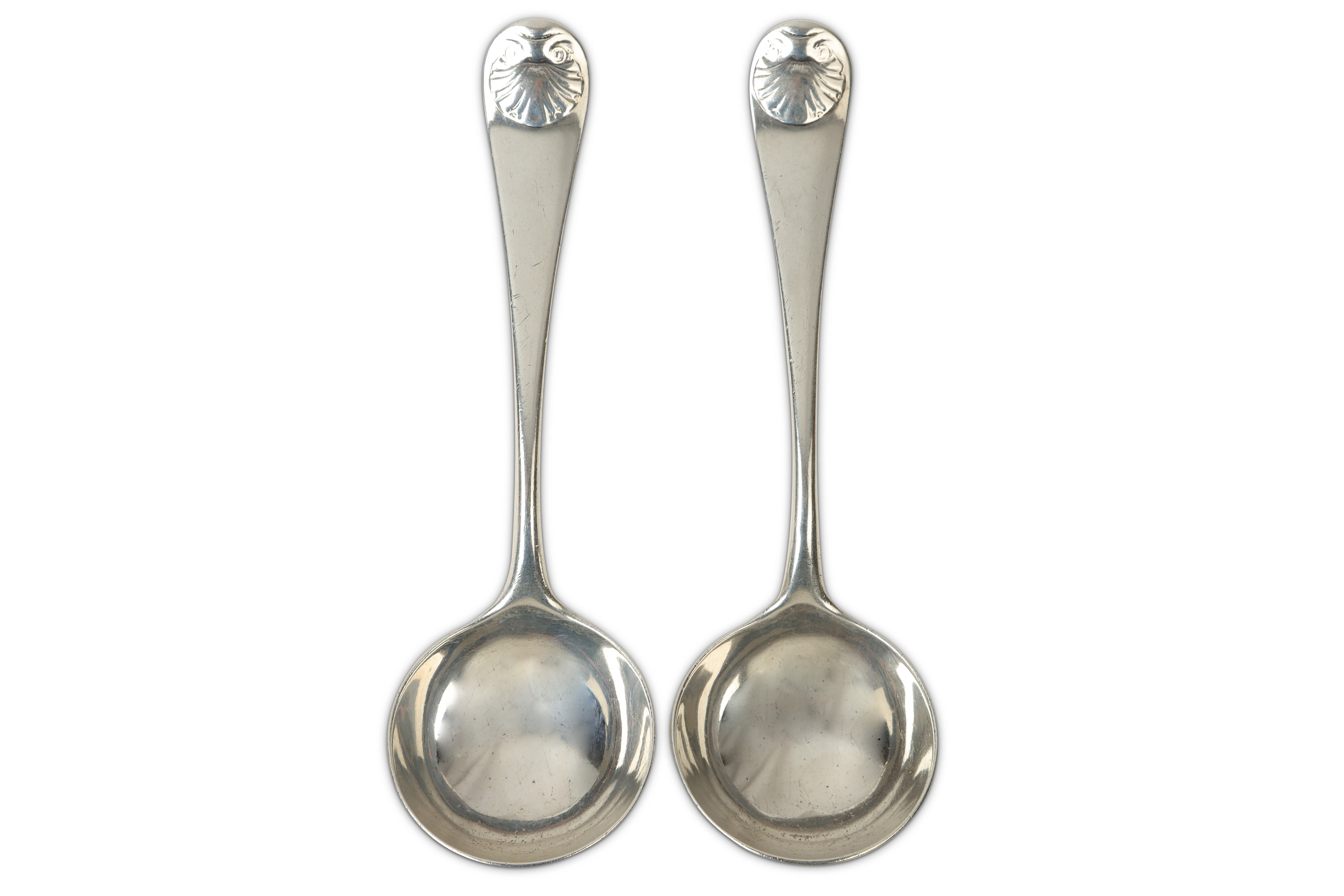 A pair of George II sterling silver sauce ladles, London 1759 by William Turner