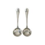 A pair of George II sterling silver sauce ladles, London 1759 by William Turner