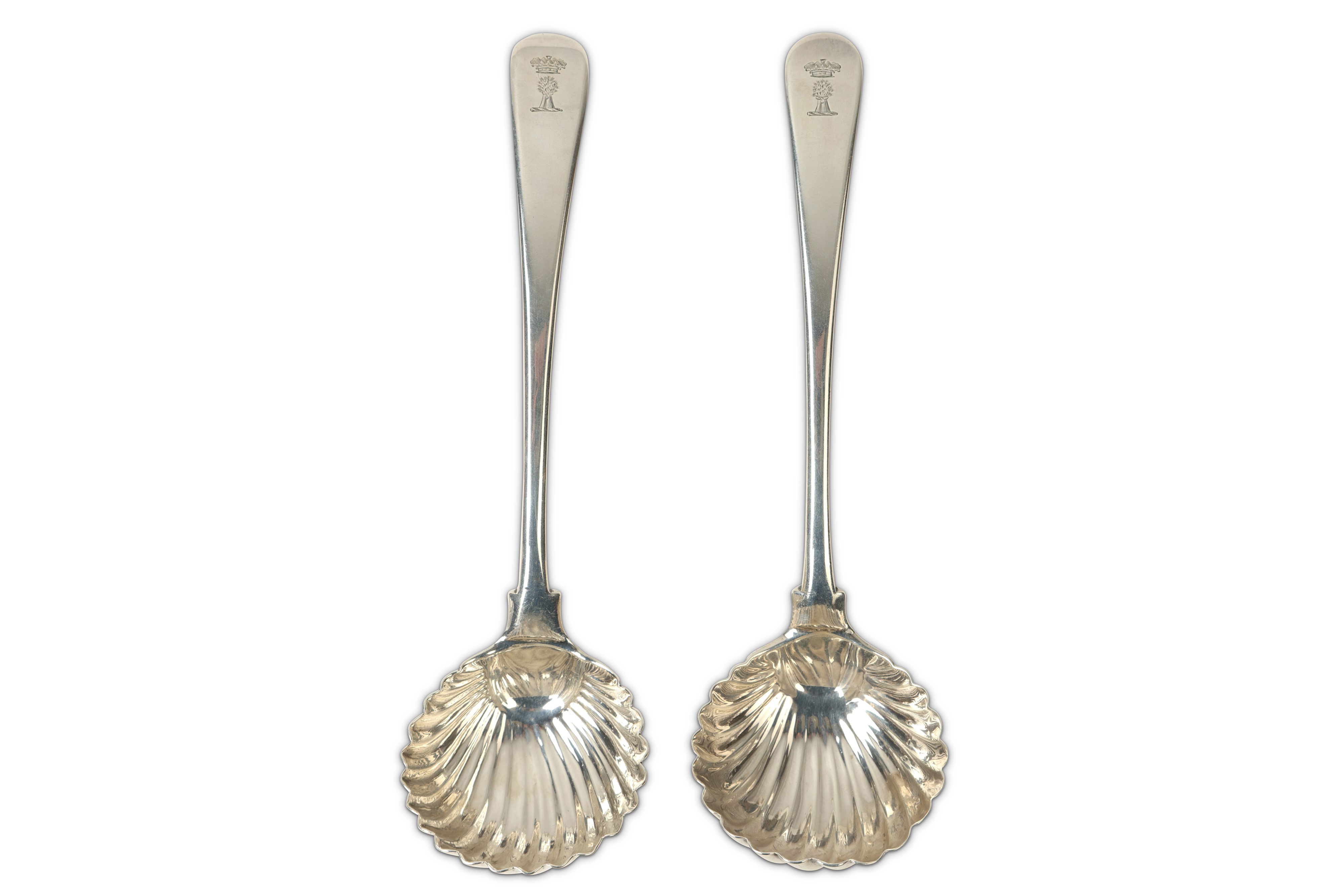 Duke of Buckingham and Chandos - A matched pair of George III sterling silver sauce ladles, one Lond