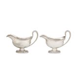 A pair of George III sterling silver sauceboats, London 1776 by John Wakelin & William Taylor (reg.