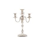 A George V sterling silver four-light candelabrum, London 1909 by Goldsmiths & Silversmiths Company