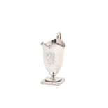 A George III sterling silver helmet cream jug, London 1779 by John Wakelin & William Taylor (reg. 25