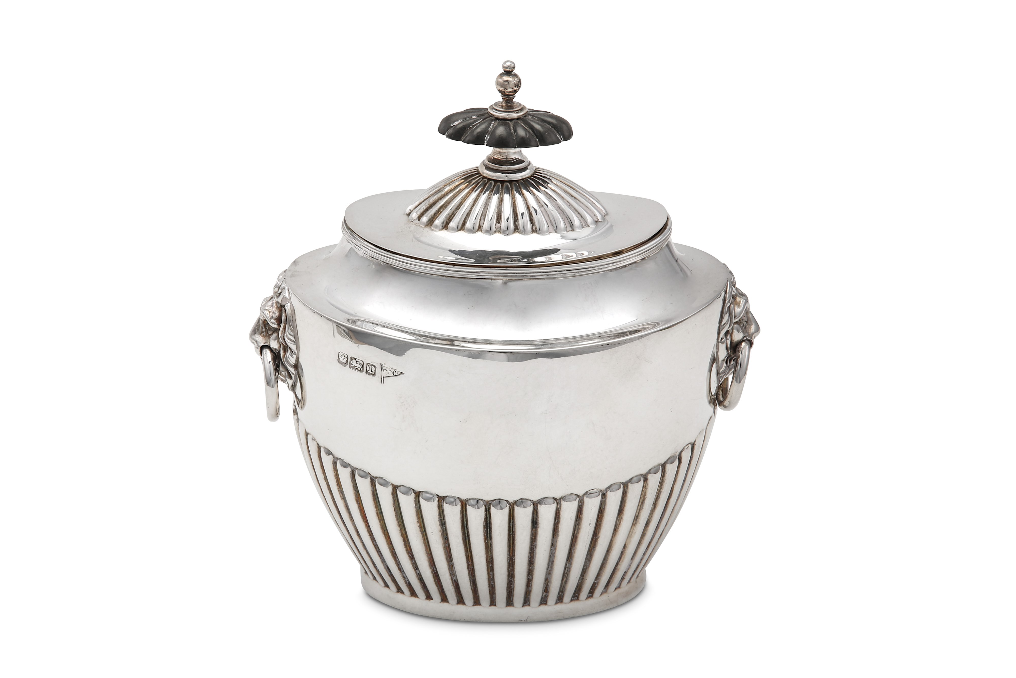 An Edwardian sterling silver tea caddy, Sheffield 1909 by Walker & Hall