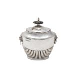 An Edwardian sterling silver tea caddy, Sheffield 1909 by Walker & Hall